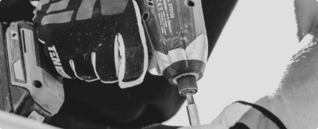 A man using a screwdriver.